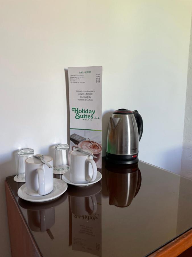 Holiday Suites Tacna Quarto foto